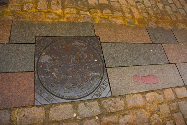 Odense, Denmark: manhole cover in Odense, Denmark — Stock Photo, Image