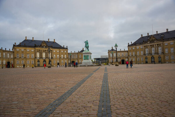 COPENHAGEN, DENMARK: Sculpture of Frederik V on Horseback in Amalienborg Square, it 's home of the Danish Royal family in Copenhagen
