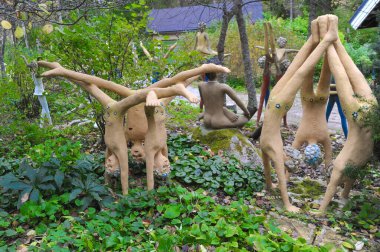 PARIKKALA, FINLAND - SEPTEMBER 29, 2013: Sculptures by ITE-artist Veijo Ronkkonen in his sculpture park. Parikkalan patsaspuisto. The park contains about 560 concrete statues and a magnificent garden.