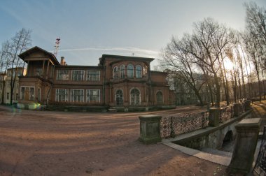 RUSSIA, SAINT PETERSBURG - FEBRUARY 26, 2014: landscape beautiful view of an old wooden mansion in Lopukhinsky Park in the city center
