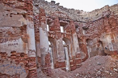 LENINGRAD REGION, RUSSIA - MARCH 9, 2014 : view of the ruined ruins of the old manor house called the Fifth Mountain on a cloudy day