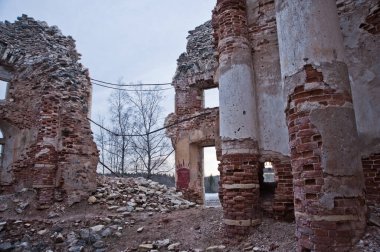 LENINGRAD REGION, RUSSIA - MARCH 9, 2014 : view of the ruined ruins of the old manor house called the Fifth Mountain on a cloudy day