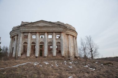 LENINGRAD REGION, RUSSIA - MARCH 9, 2014 : view of the ruined ruins of the old manor house called the Fifth Mountain on a cloudy day