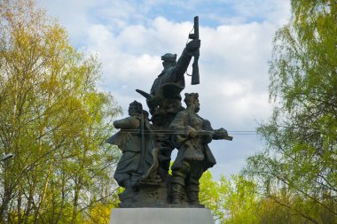 OSTASHKOV, TVER REGION, RUSSIA - MAY 9, 2014: Celebrations of people on may 9, victory in the war of 1945. People gathered in the center of the city at the monument of soldiers