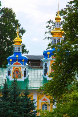 PECHORY, PSKOV OBLAST, RUSSIA - AUGUST 8, 2009: view of beautiful buildings and Orthodox churches Ancient Pskov-Pechersky monastery in Pechory, near Pskov