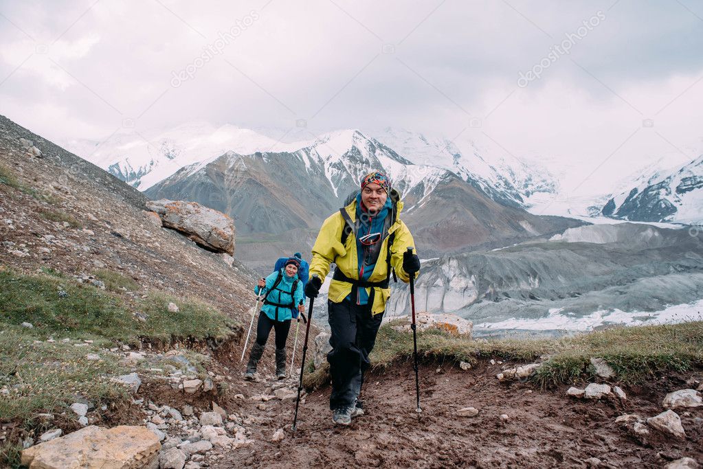 people climbing in mountains