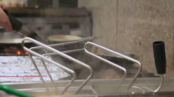 Chef is stirring vegetables in a pan. — Stock Video