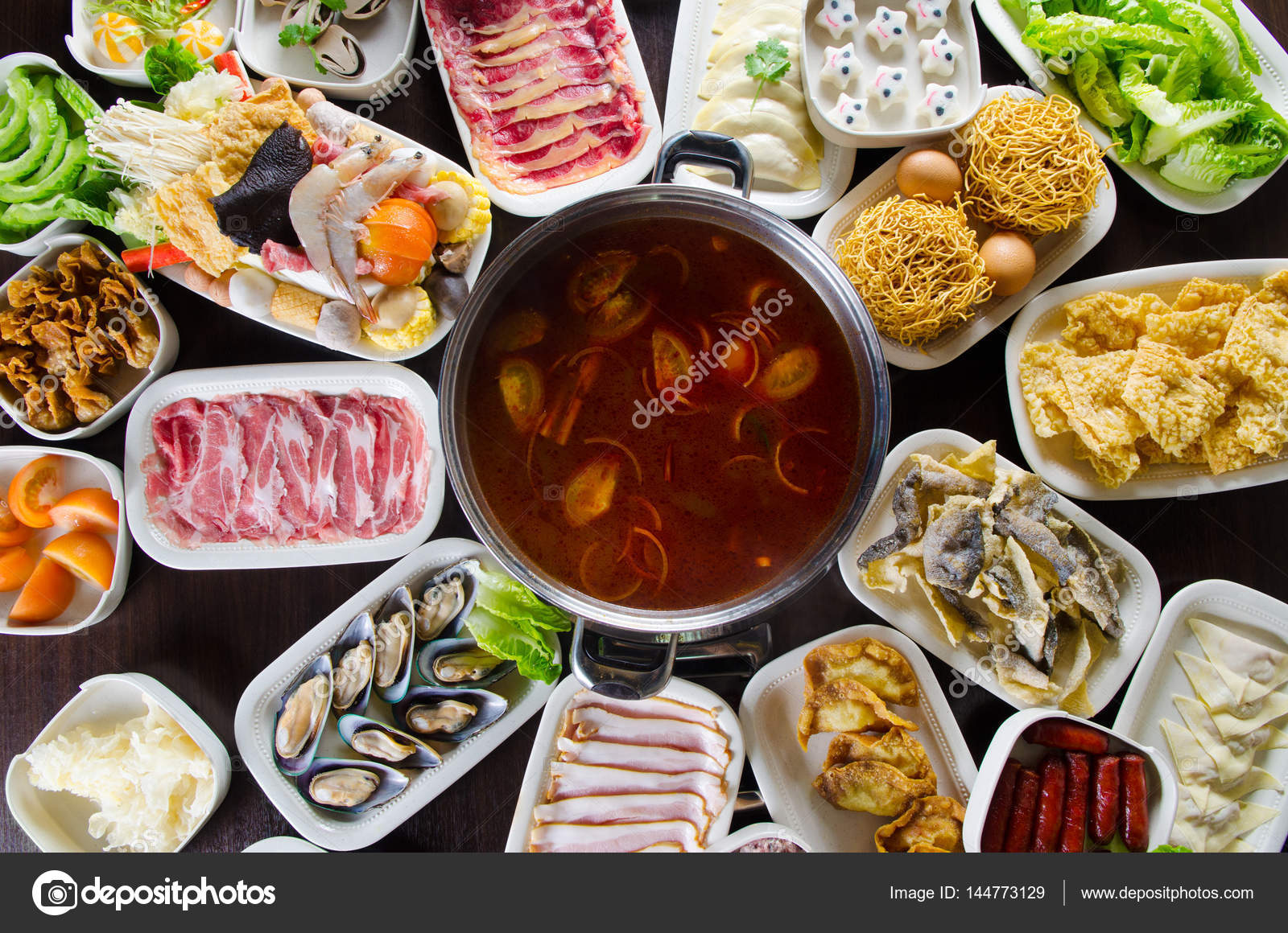 Hot pot meals Stock Photo by ©szeyuen 144773129