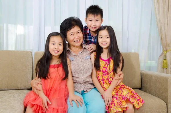 Grandmother and grandchildren — Stock Photo, Image