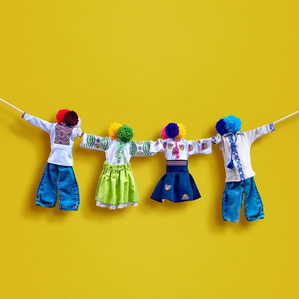 Handmade textile dolls on background, traditional ukrainian folk rag doll Motanka in ethnic style, ancient culture folk crafts tradition of Ukraine. Most Popular Souvenirs From Ukraine.