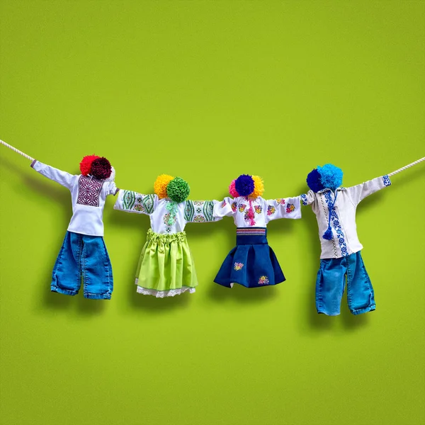 Handmade textile dolls on background, traditional ukrainian folk rag doll Motanka in ethnic style, ancient culture folk crafts tradition of Ukraine. Most Popular Souvenirs From Ukraine.