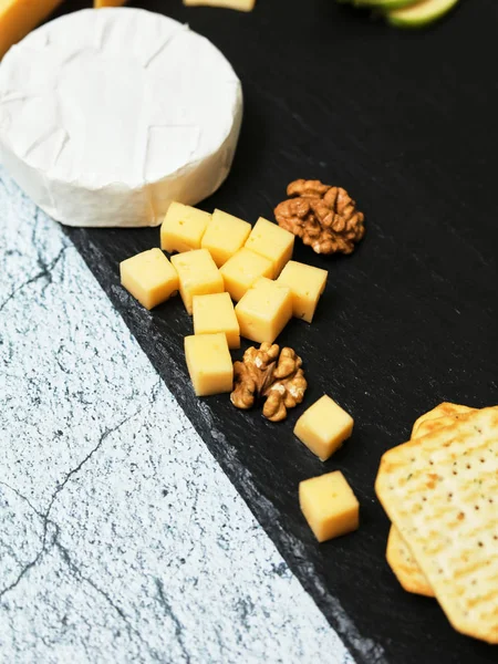 Pieces Cheese Dark Background Cheeseboard Sliced Apple Nuts Board — Stockfoto