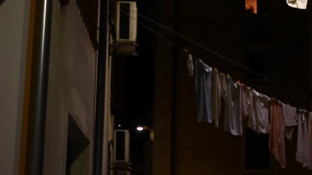 Suspended Laundry Two Buildings Night – Stock-video