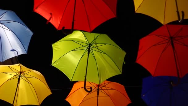 Opened Colorful Bold Colored Umbrellas Hanging Wires Street — ストック動画