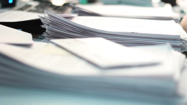 Close Paper Stack Staples Shallow Dof Interesting Light Old Documents — Stockvideo