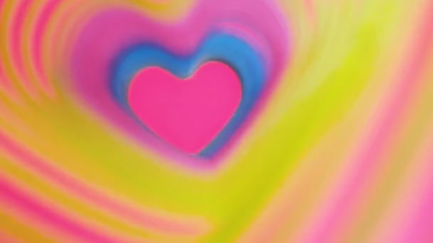 Colorful beating heart Rainbow spring. Valentines Day concept. Pink heart frame slow motion. Lgbt glbt sign — Stock Video