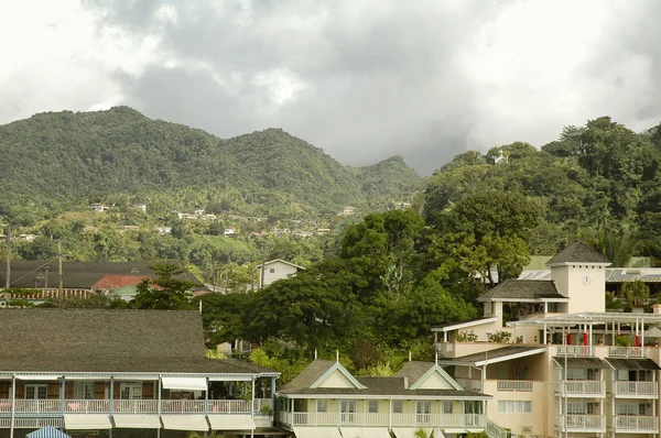 Waterfront Hotels and mountainous landscape at the background in Rosseau, Dominica