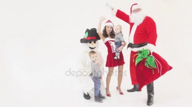 Baban Noel Baba. Noel'de hediye kutuları verir