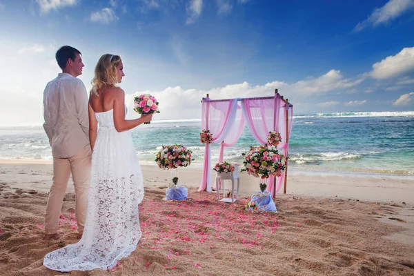 Wedding couple just married at the beach, Hawaii.