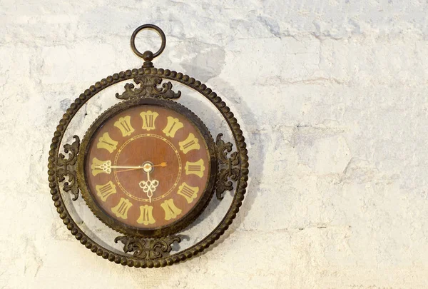 Old Antique Clock On  White Bricks background