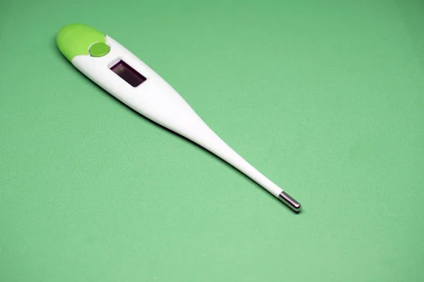Electronic Medical Thermometer Green Background — Stock Photo, Image