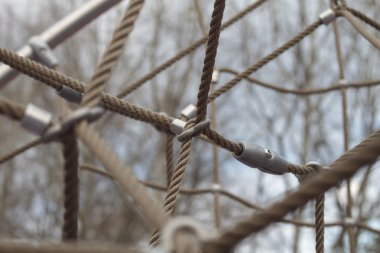 Halatlar ve deniz mili Bahçesi closeup oynamak için ağ 