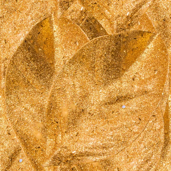 Fond sans couture doré avec des feuilles décoratives dorées — Photo