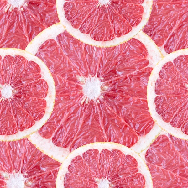 Nahtloser Hintergrund mit Grapefruitscheiben — Stockfoto