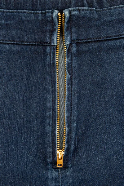 Metal zipper on denim skirt