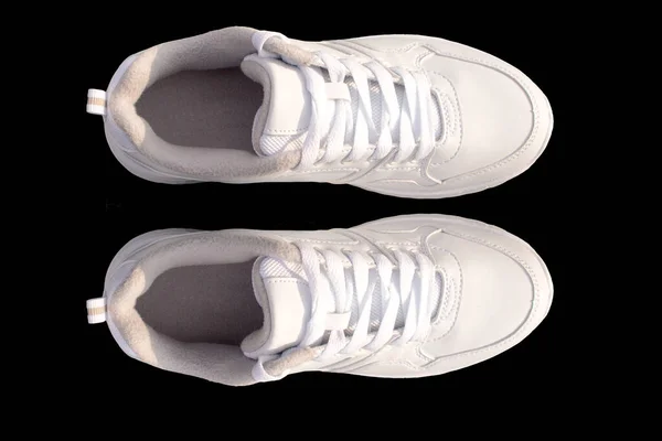 Zapatillas Blancas Con Cordones Blancos Aislados Sobre Fondo Negro — Foto de Stock