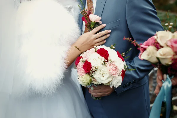 Beautiful luxury bouquet in hands — Stock Photo, Image