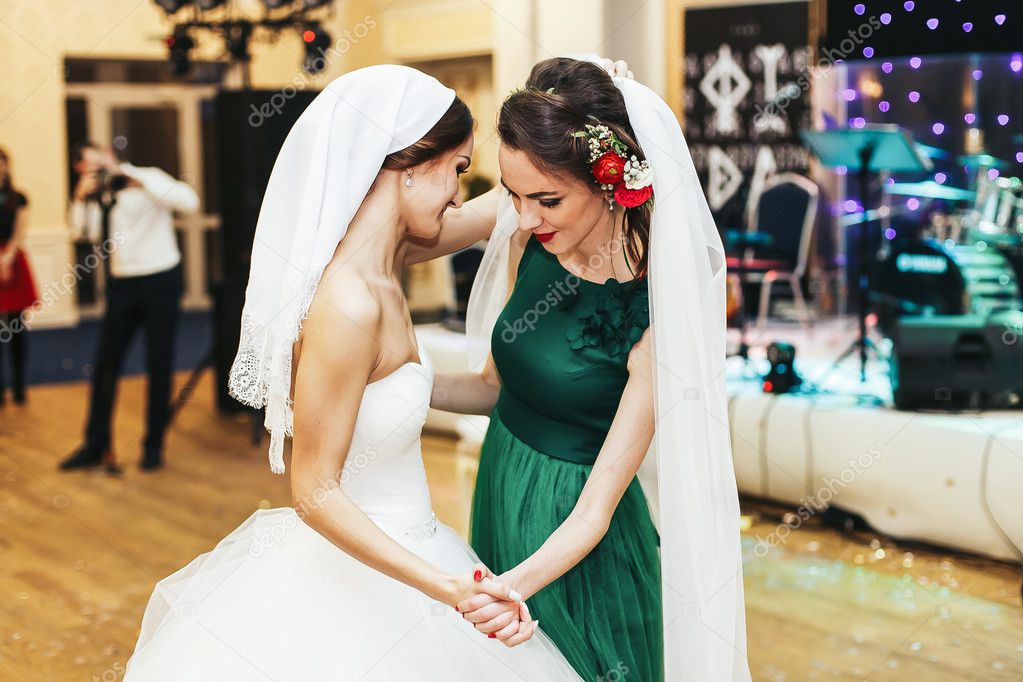 Bridesmaid dance in the bride's veil 