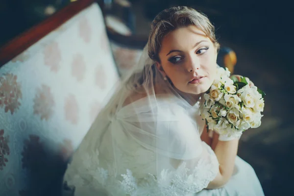 Bride in white laces looks old-fashioned — Stock Photo, Image