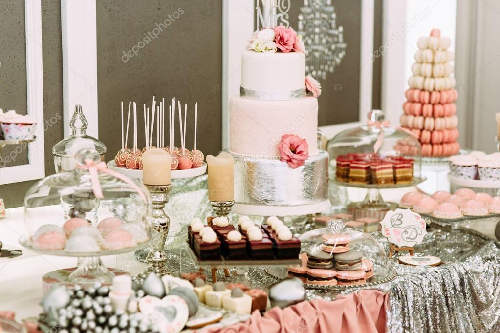 Specially decorated table with sweets for the wedding