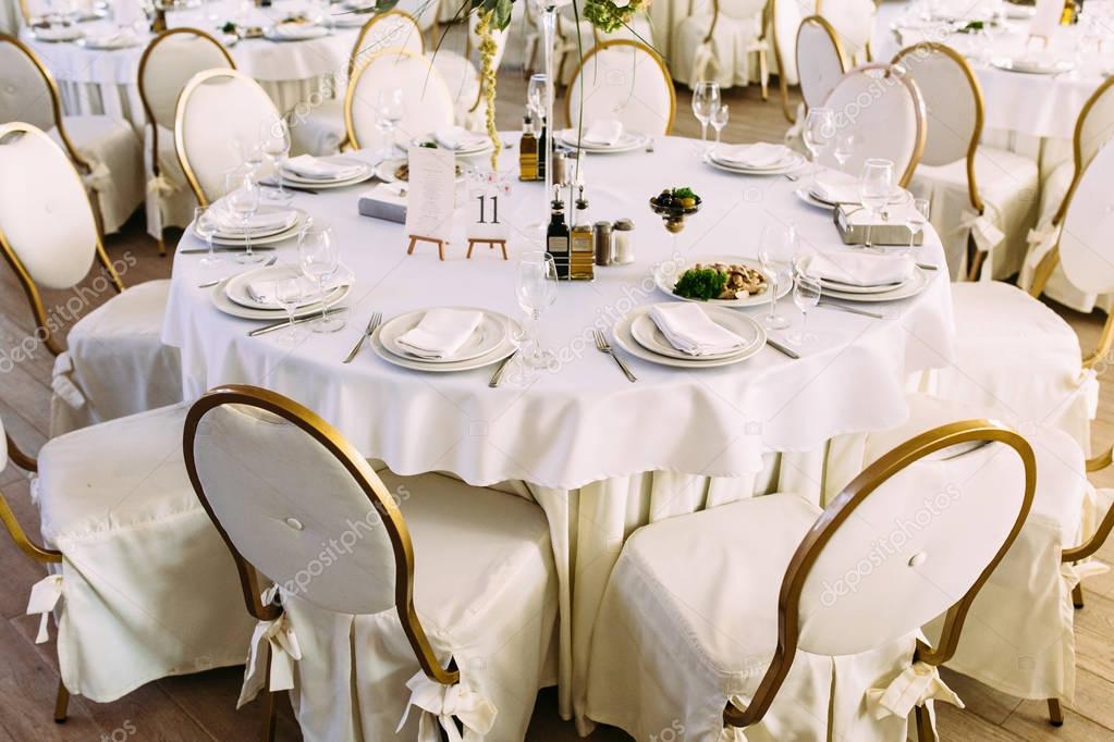 White and gold colored chairs