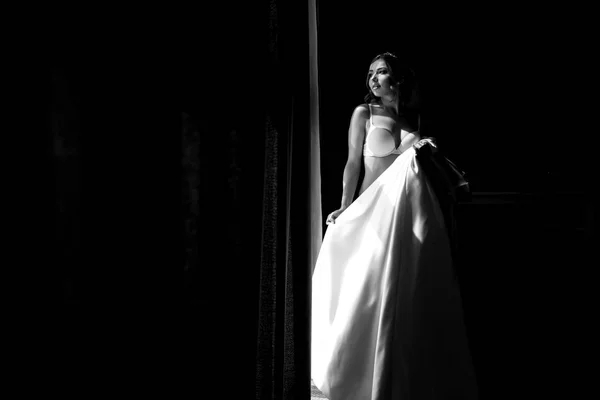 Black and white photo of the bride in the underwear — Stock Photo, Image