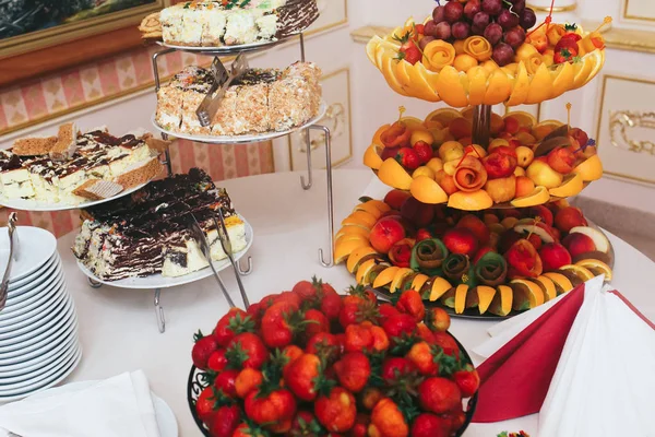 Fruits arranged for a table with desserts — Stock Photo, Image