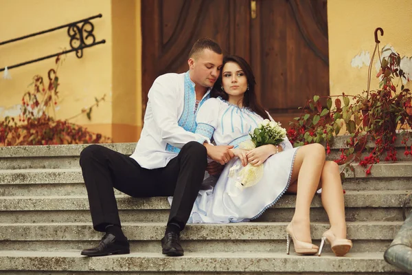 Groom hugs a bride — Stock Photo, Image