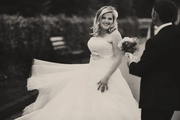 Bride whirls standing behind a groom — Stock Photo, Image