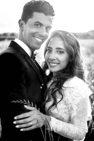 Black and white picture of stunning Italian couple posing in the — Stock Photo, Image