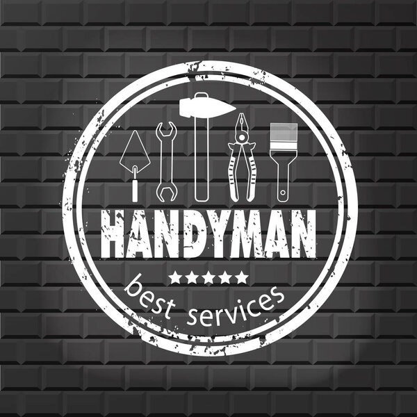 Handyman services vector design for your logo or emblem with stamp on the gray brick wall. Set of workers tools. Stock vector. Flat design. 