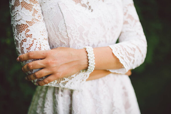 The bride's hands. Beautiful ring and bracelet