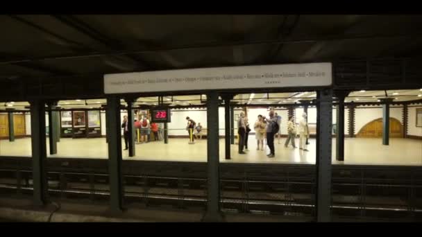 Budapest Hungary vintage old metro train stop underground. Yellow train in Budapest metro. Interior of metro station in Budapest. Subway Line 1. July 15, 2017. Hungary. Budapest — Stock Video