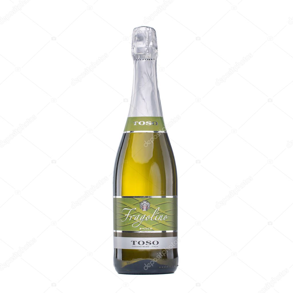 Bottle of Italian wine. Full wine bottle Isolated on white background. Wine bottle with label Sparkling wine Fragolino Bianco, Toso, Fragolino Bianco, Toso, white sweet. Kiev, Ukraine December 6, 2019