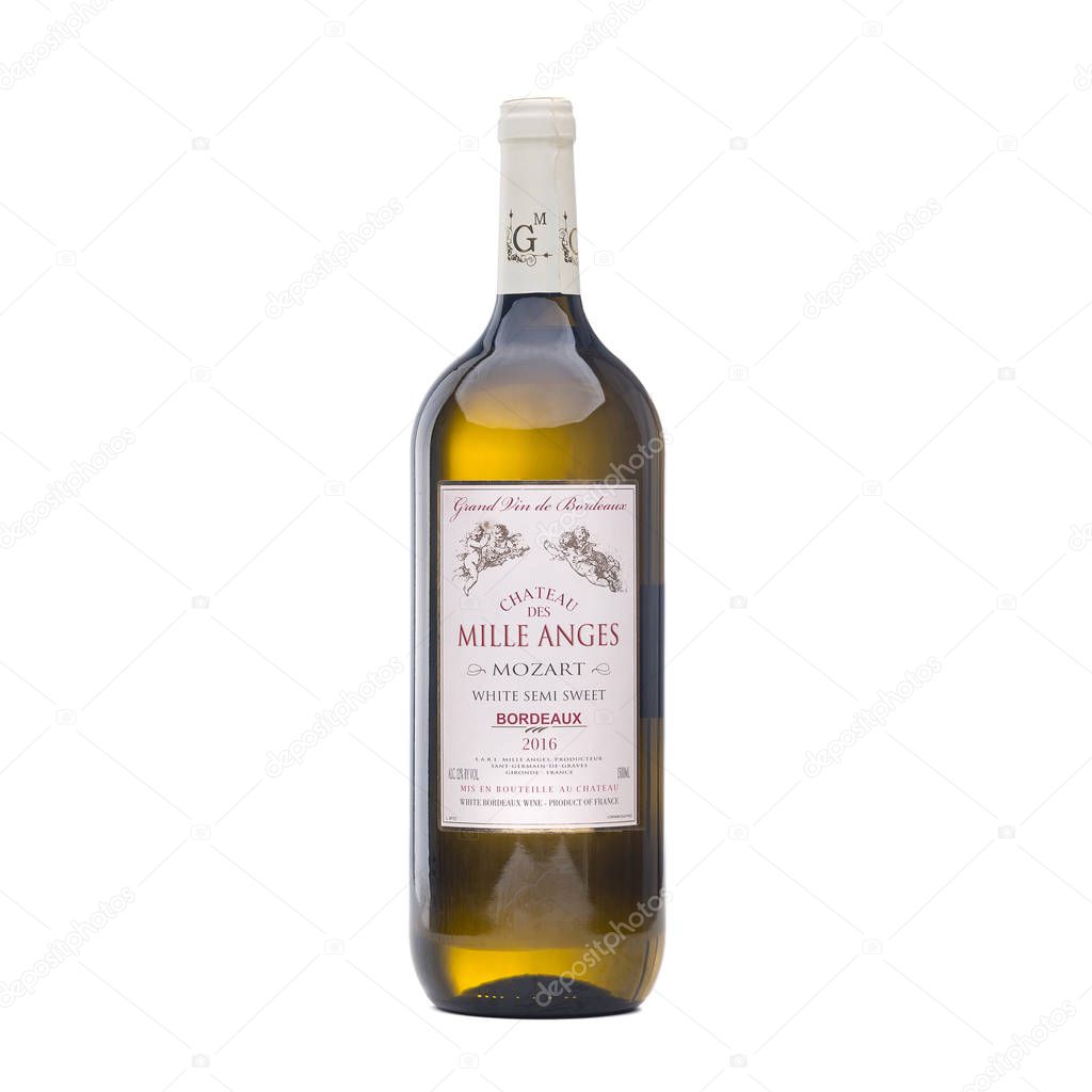 Bottle of Italian wine on white background. Full white wine bottle. Isolated on a white background. Wine bottle isolated with label Chateau des Mille Anges Mozart 2016 Kiev, Ukraine December 6, 2019.