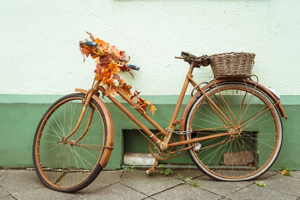 Bicycle Parked On City Street. A city bike in Dusseldorf. Urban bike parked without anyone on European street. Bicycle ecological mode of transport in Europe. Dusseldorf, Germany October 25, 2018