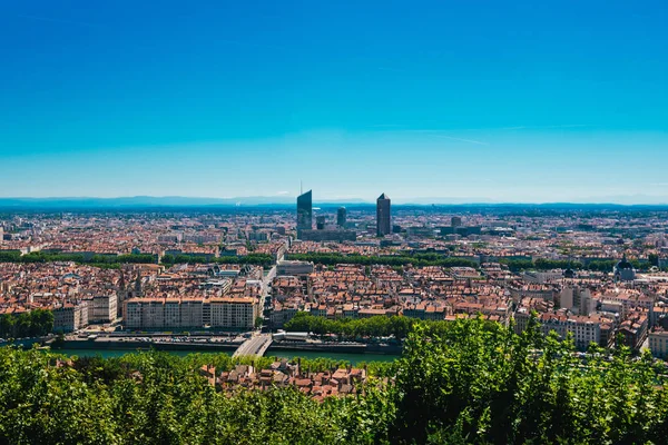 Lyon panorama elevated view on sunny day. Aerial panoramic view of Lyon with the skyline. Top view of Lyon cityscape with Pont Marechal Juin and Rhone river from Fourviere Hill