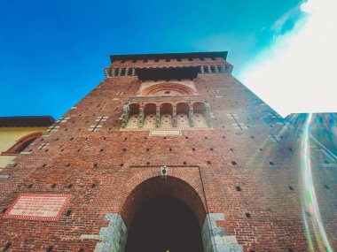 Tower Torrione del Carmine, La torre del Filarete and brick walls of old medieval Sforza Castle Castello Sforzesco. Milan, Lombardy September 26, 2019
