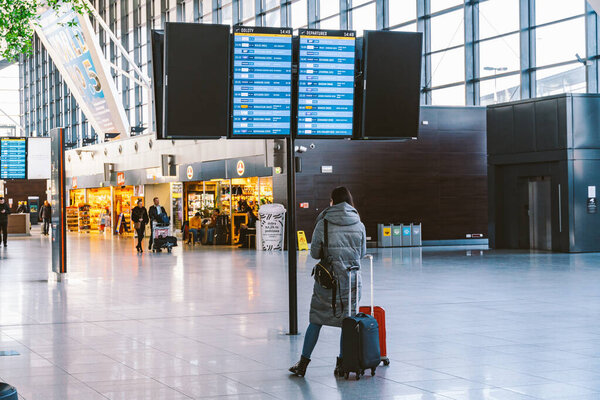 Arrivals board at Gdansk, Poland, February 14, 2020 airport. Terminal of Gdansk airport GDN in Poland. Interior of modern terminal Lech Walesa Airport in Gdansk. Arrival departure board at terminal.