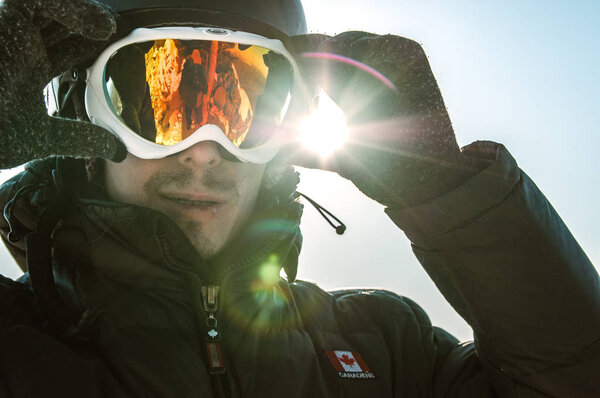 skier with glasses and helmet